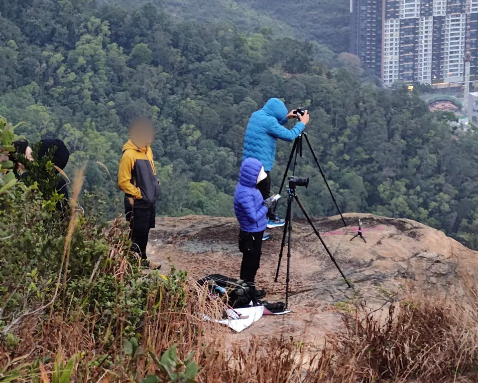 People standing near the cliff