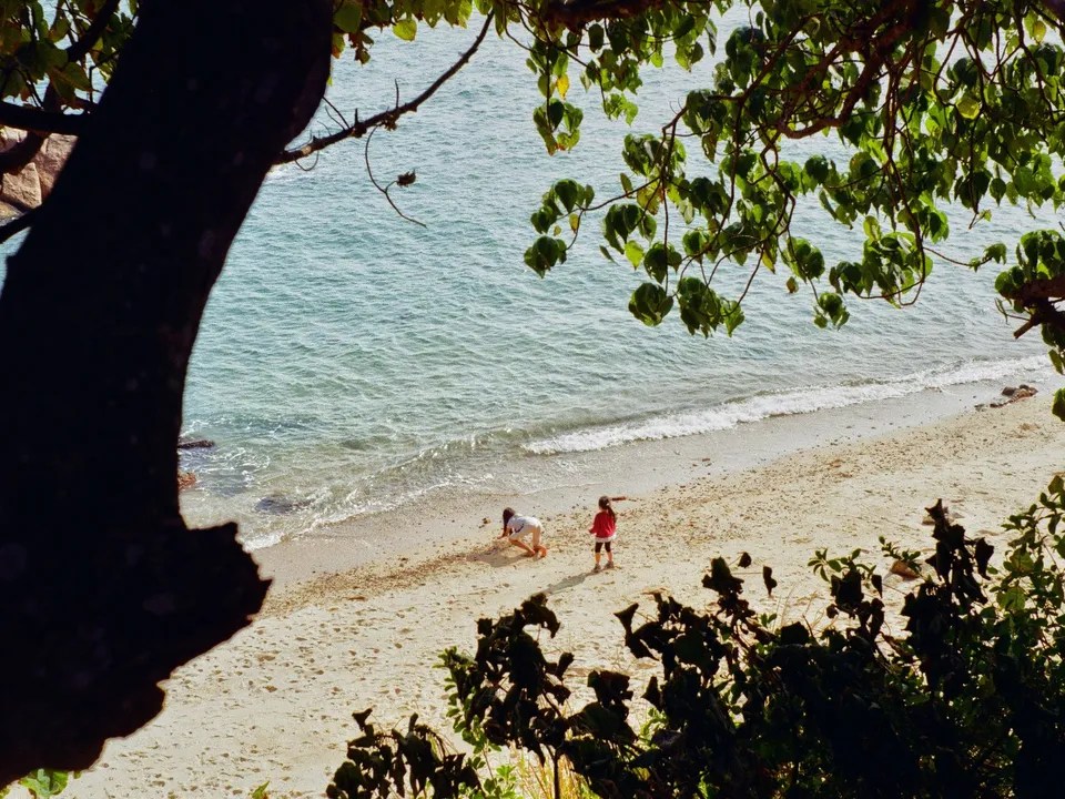 Sisters playing on the beach
