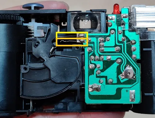 Front of FunSaver, circuit board, switch contacts