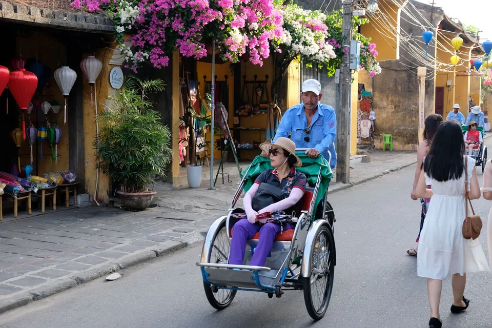Vietnam tricycle carrying traveller