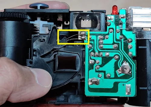 Front of FunSaver, circuit board, flash switch closed by shutter movement