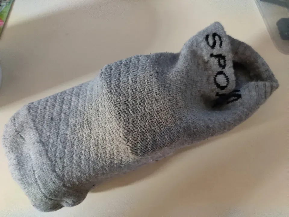 Sunpak auto 24 SR flash unit inside a sock fully